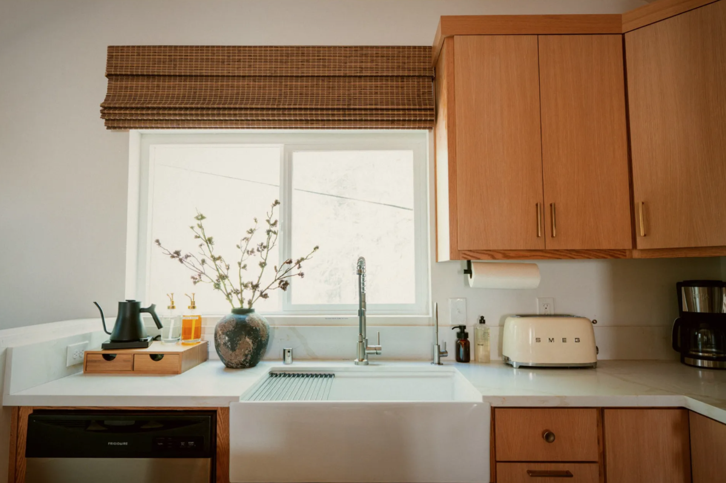 The renovated kitchen in warm wood