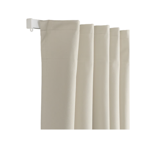 Cream-colored pleated fabric curtain hanging from a white rod., selected for Wildernest Yosemite's Bedrooms & Sheets