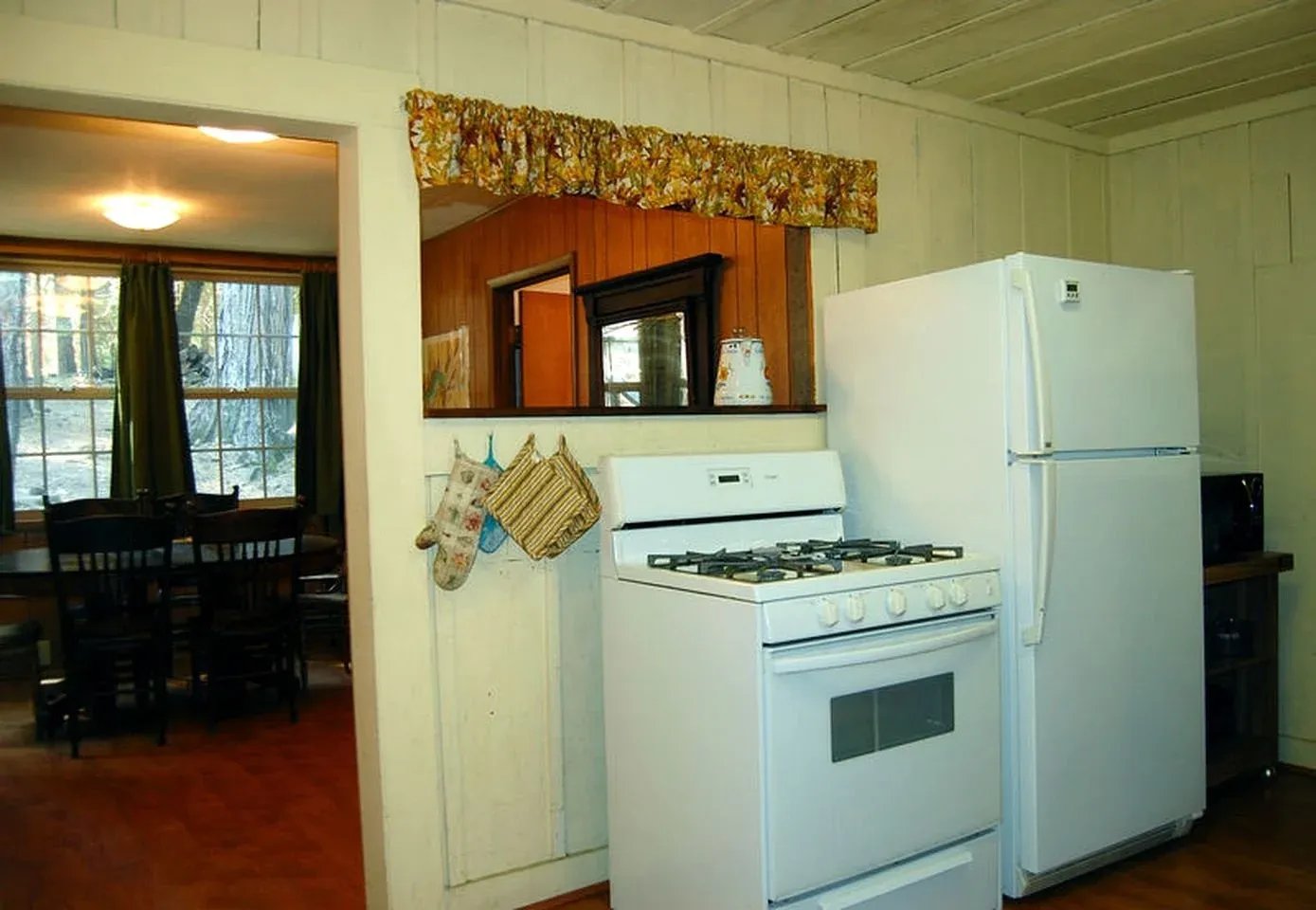 The original kitchen with white appliances